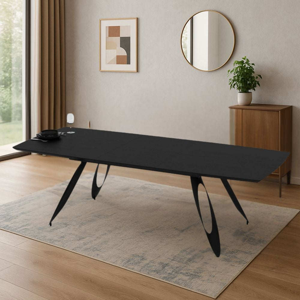 Tavolo allungabile Merkur con gambe in metallo sagomate e piano colore nero 190x103x76H