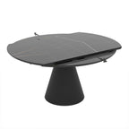 Tavolo girevole allungabile Yandan con piano effetto marmo nero lucido e base conica in metallo nero 150x94x76H