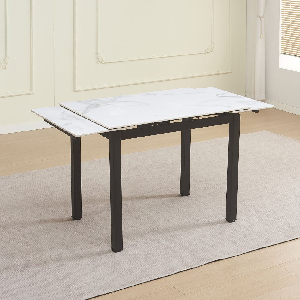 Tavolo allungabile Kyoto con piano in ceramica marmo bianco e struttura in metallo nero 100x70x75H