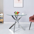 Tavolo rotondo 130x130 cm in vetro temperato con gambe incrociate cromate Peyton
