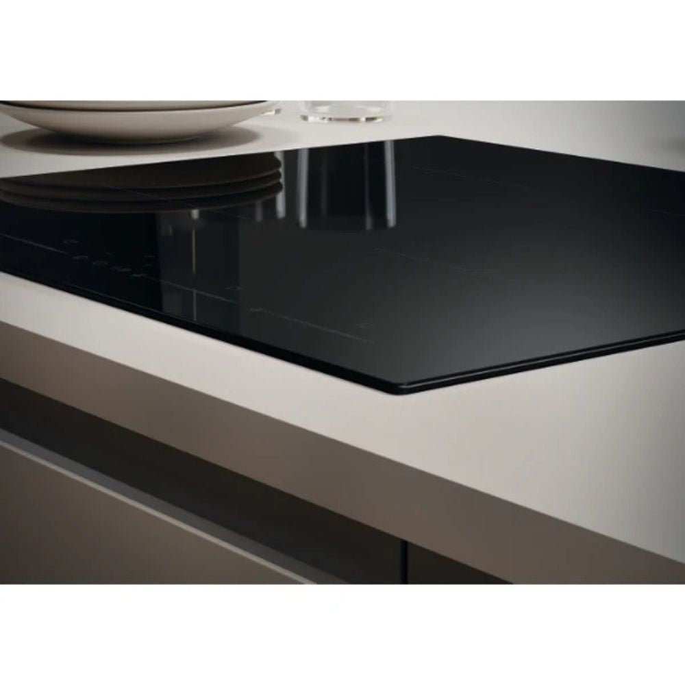 TABLE DE CUISSON À INDUCTION 4 ZONES DE CUISSON NOIRES CANDY L x P x H (mm) : 590x520x60