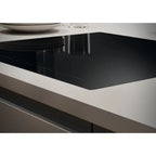 TABLE DE CUISSON À INDUCTION 4 ZONES DE CUISSON NOIRES CANDY L x P x H (mm) : 590x520x60